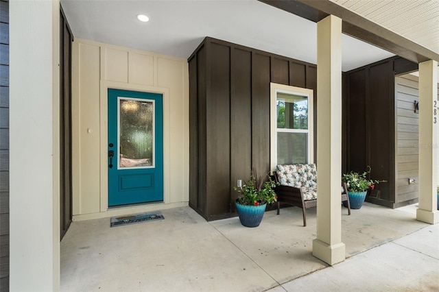 283 Riley Lake Dr, Hawthorne, FL 32640 - property entrance with board and batten siding and covered porch