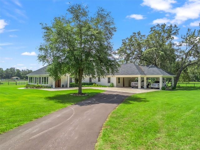 402 SW 127th Pl, Ocala, FL 34473 - view of front facade with asphalt driveway and a carport