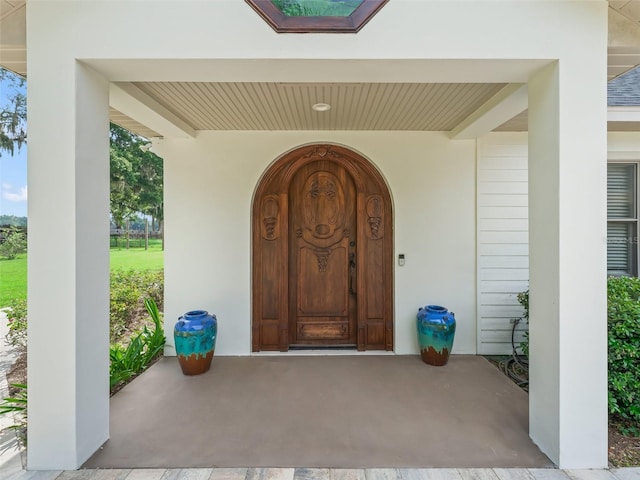 402 SW 127th Pl, Ocala, FL 34473 - entrance to property with stucco siding and a porch