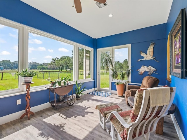 402 SW 127th Pl, Ocala, FL 34473 - sunroom / solarium with baseboards and wood finished floors
