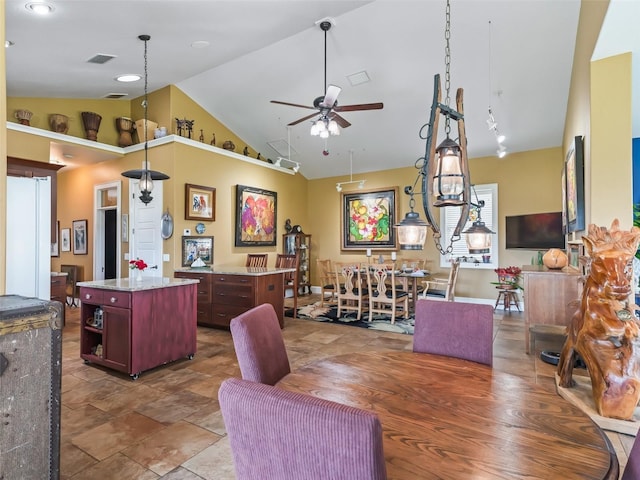 402 SW 127th Pl, Ocala, FL 34473 - dining room featuring a ceiling fan and high vaulted ceiling
