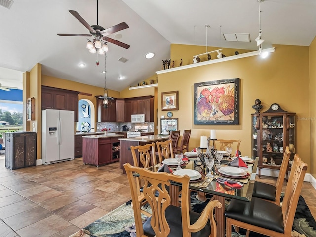 402 SW 127th Pl, Ocala, FL 34473 - dining room with ceiling fan, vaulted ceiling, and recessed lighting