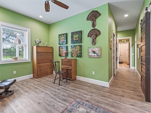 402 SW 127th Pl, Ocala, FL 34473 - sitting room featuring baseboards, wood finished floors, ceiling fan, and recessed lighting
