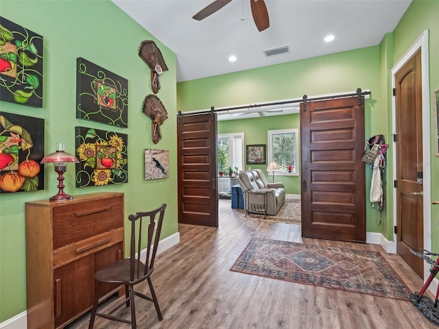 402 SW 127th Pl, Ocala, FL 34473 - office space with a barn door, baseboards, wood finished floors, a ceiling fan, and recessed lighting