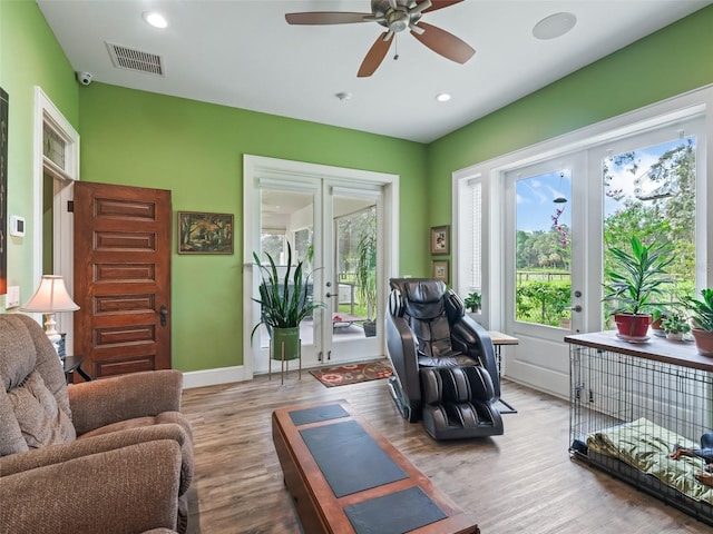 402 SW 127th Pl, Ocala, FL 34473 - living area featuring ceiling fan, wood finished floors, french doors, baseboards, and recessed lighting