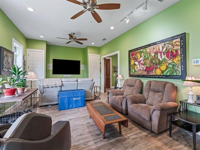 402 SW 127th Pl, Ocala, FL 34473 - living room with ceiling fan, wood finished floors, and recessed lighting