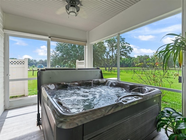 402 SW 127th Pl, Ocala, FL 34473 - sunroom / solarium with a jacuzzi, plenty of natural light, and ceiling fan