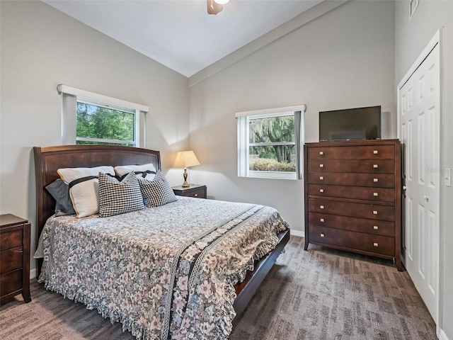 402 SW 127th Pl, Ocala, FL 34473 - bedroom featuring a closet, baseboards, high vaulted ceiling, and a ceiling fan