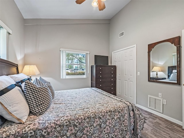 402 SW 127th Pl, Ocala, FL 34473 - carpeted bedroom with baseboards, high vaulted ceiling, ceiling fan, and a closet