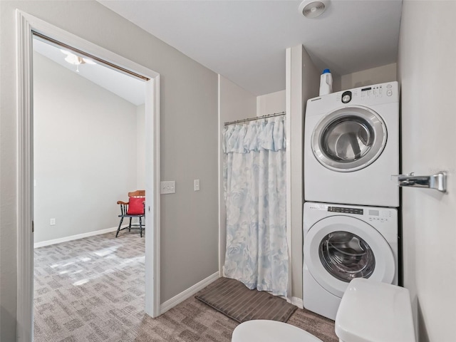 402 SW 127th Pl, Ocala, FL 34473 - full bath featuring estacked washer and dryer, toilet, curtained shower, and baseboards