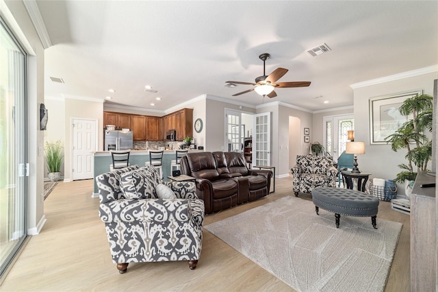 7263 SW 99th Cir, Ocala, FL 34481 - living area featuring a ceiling fan, recessed lighting, light wood-style floors, baseboards, and ornamental molding