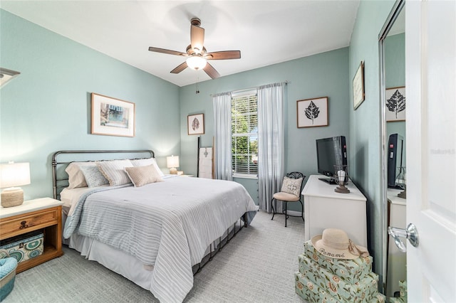 7263 SW 99th Cir, Ocala, FL 34481 - bedroom with a ceiling fan and light colored carpet