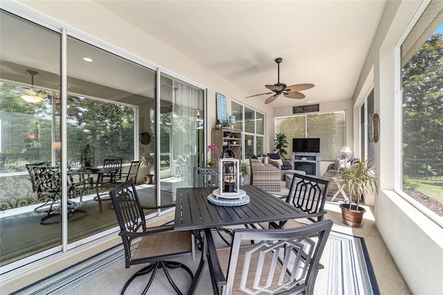 7263 SW 99th Cir, Ocala, FL 34481 - sunroom / solarium featuring a ceiling fan and outdoor dining area