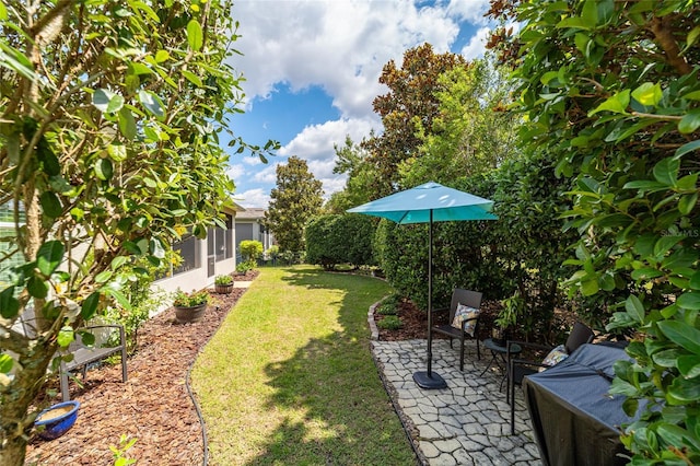 7263 SW 99th Cir, Ocala, FL 34481 - view of green lawn featuring a patio and a sunroom