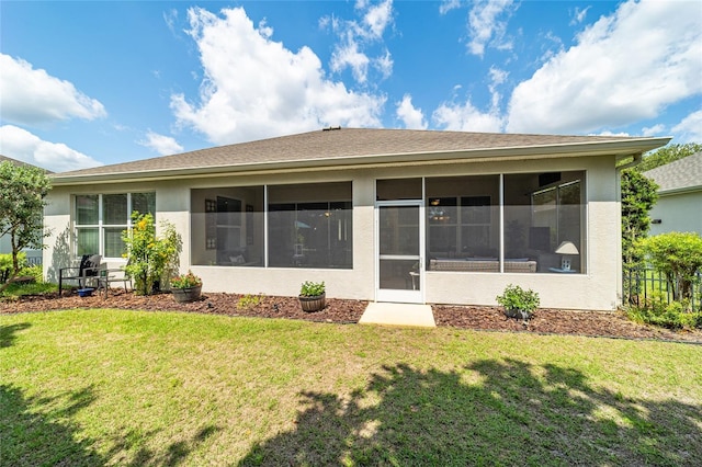 7263 SW 99th Cir, Ocala, FL 34481 - rear view of property with a sunroom and stucco siding