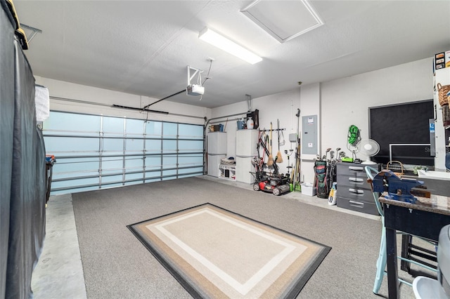 7263 SW 99th Cir, Ocala, FL 34481 - garage with a garage door opener and refrigerator