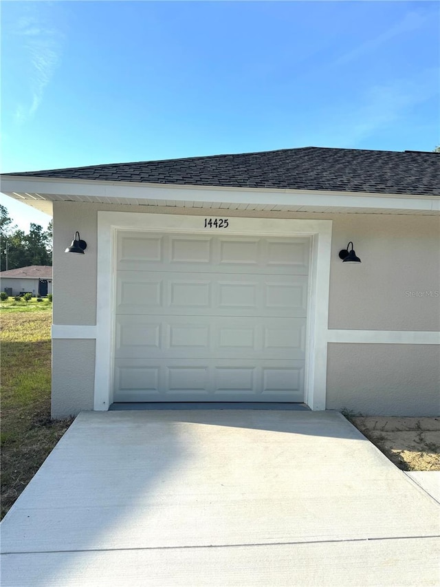 14425 SW 21st Pl, Ocala, FL 34481 - garage featuring concrete driveway