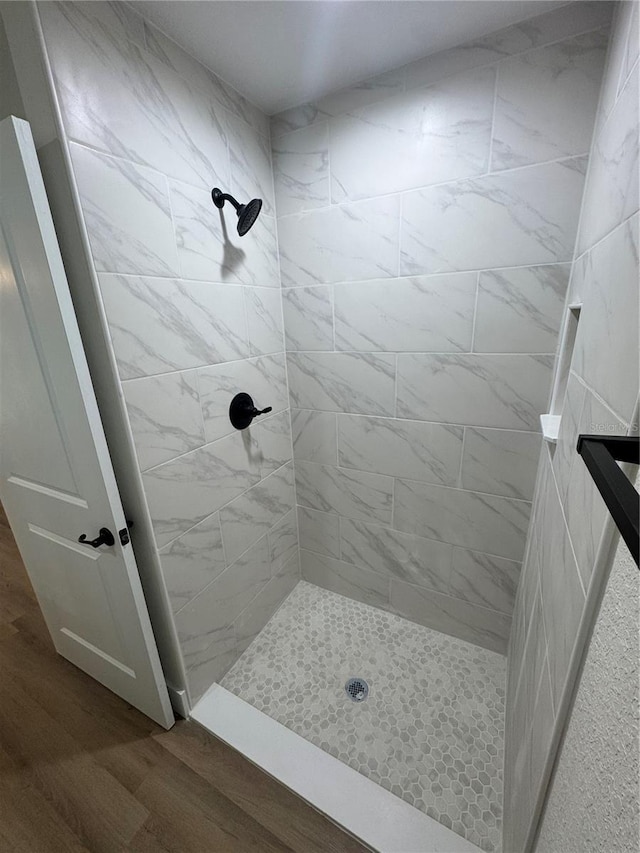 14425 SW 21st Pl, Ocala, FL 34481 - bathroom with a shower stall and wood finished floors