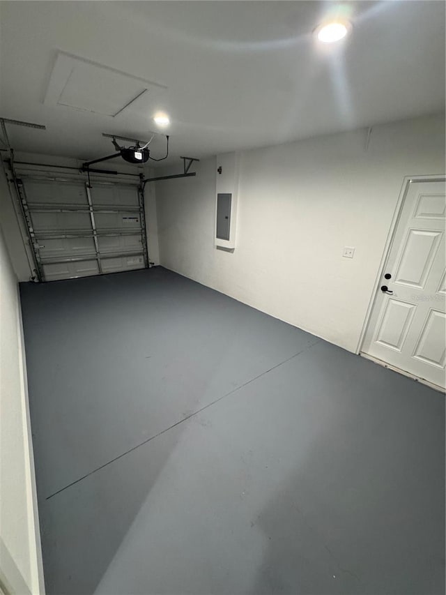 14425 SW 21st Pl, Ocala, FL 34481 - garage with a garage door opener and electric panel