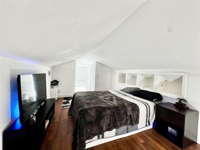 3005 NE 19th Ave, Ocala, FL 34479 - bedroom featuring wood finished floors, lofted ceiling, and a textured ceiling