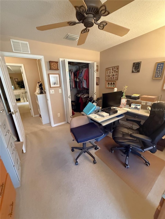 1001 NE 22nd Ave, Ocala, FL 34470 - office featuring ceiling fan, a textured ceiling, and light carpet
