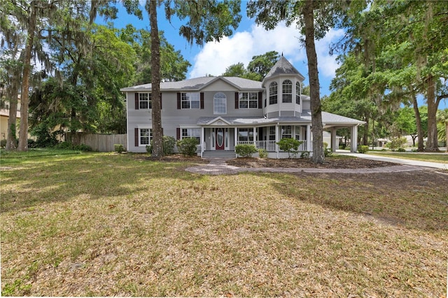 1628 SE 29th Ter, Ocala, FL 34471 - victorian home featuring a porch