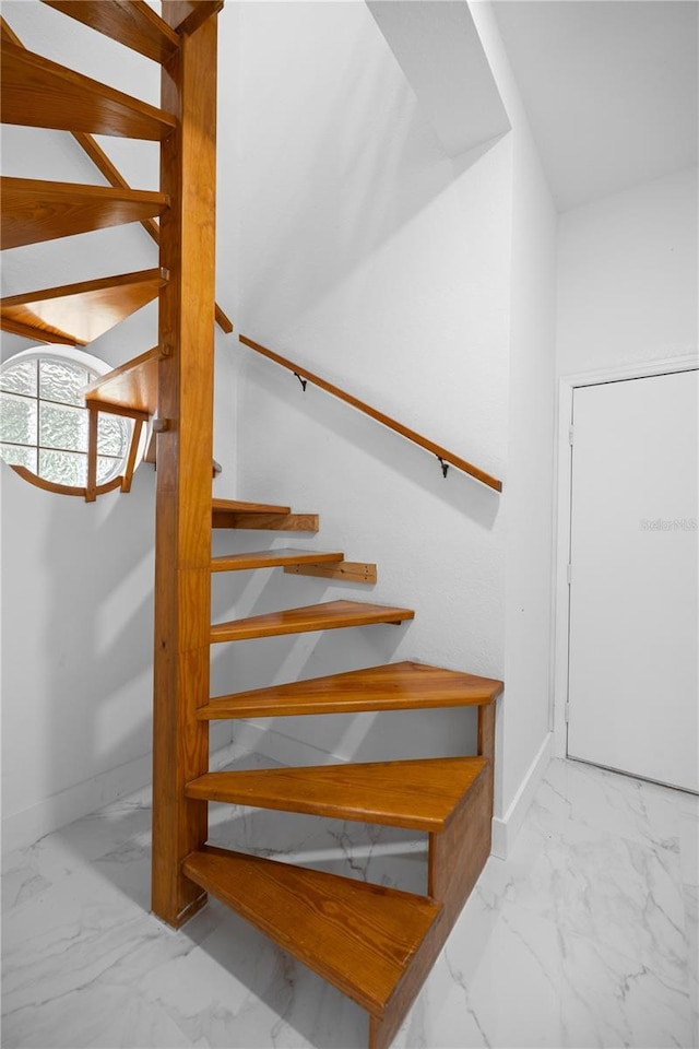1628 SE 29th Ter, Ocala, FL 34471 - stairs with marble look tiles and baseboards