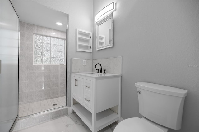 1628 SE 29th Ter, Ocala, FL 34471 - full bath featuring toilet, tiled shower, vanity, and marble finish floors
