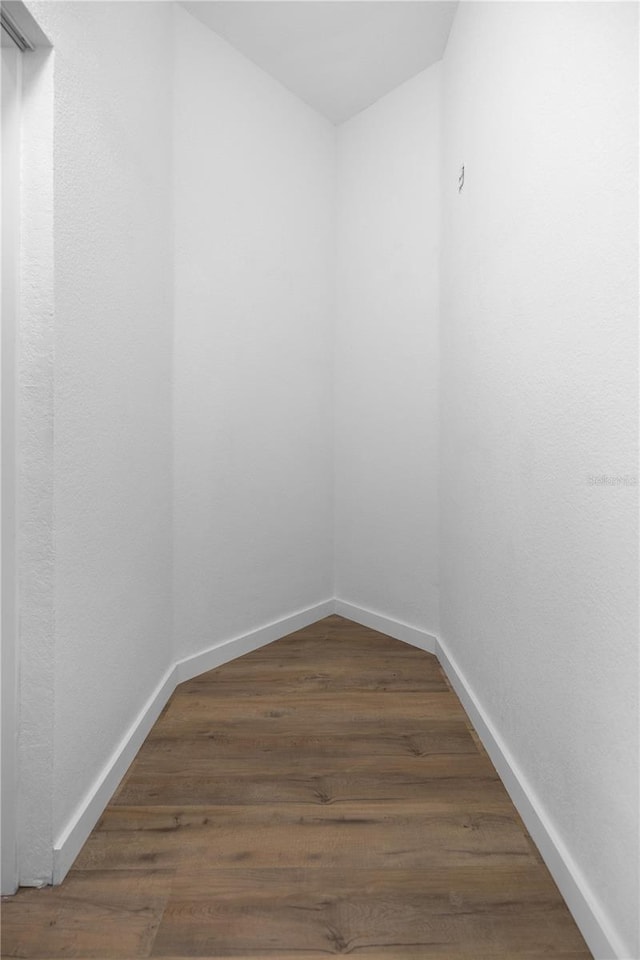 1628 SE 29th Ter, Ocala, FL 34471 - spare room with baseboards and wood finished floors