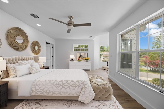 1628 SE 29th Ter, Ocala, FL 34471 - bedroom with wood finished floors, baseboards, ceiling fan, and recessed lighting