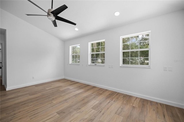1628 SE 29th Ter, Ocala, FL 34471 - spare room with a ceiling fan, baseboards, lofted ceiling, wood finished floors, and recessed lighting