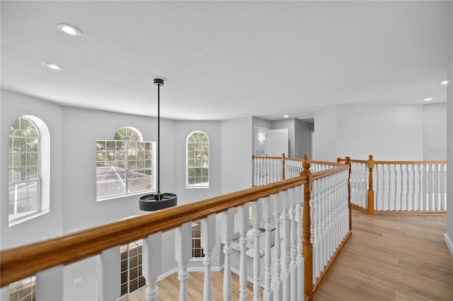 1628 SE 29th Ter, Ocala, FL 34471 - hallway with recessed lighting, plenty of natural light, wood finished floors, an upstairs landing, and baseboards