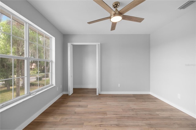1628 SE 29th Ter, Ocala, FL 34471 - unfurnished room with healthy amount of natural light, ceiling fan, and baseboards