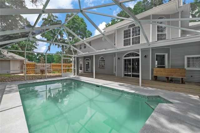 1628 SE 29th Ter, Ocala, FL 34471 - view of pool featuring a deck and glass enclosure