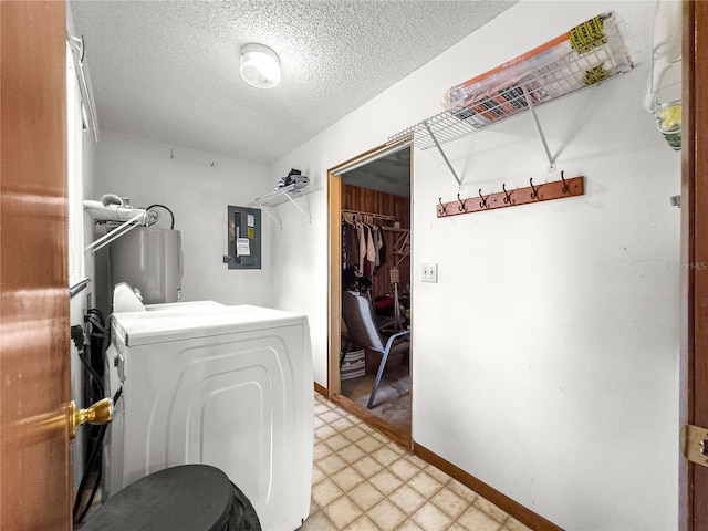 10520 SW 85th Ter, Ocala, FL 34481 - laundry area with light flooring, washer / clothes dryer, a textured ceiling, electric panel, and baseboards