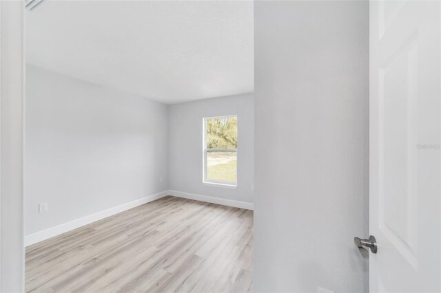 14790 SW 32nd Pl, Ocala, FL 34481 - spare room with light wood-type flooring and baseboards