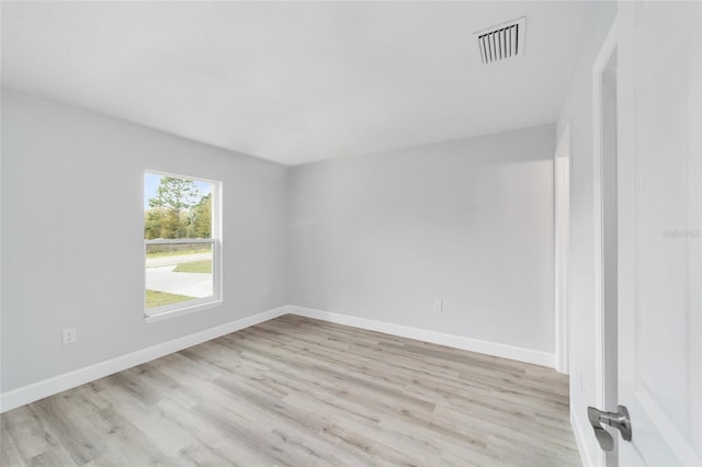 15424 SW 27th Ln, Ocala, FL 34481 - spare room with light wood-style flooring and baseboards