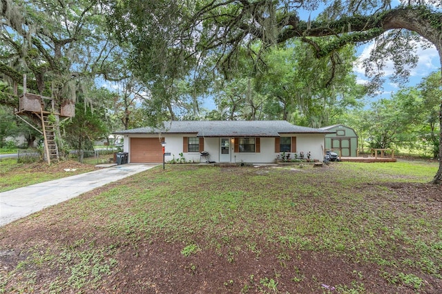 3800 NE 24th Ct, Ocala, FL 34479 - single story home featuring an attached garage, concrete driveway, a front lawn, covered porch, and stucco siding