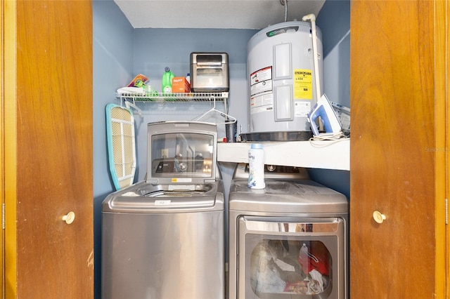 3800 NE 24th Ct, Ocala, FL 34479 - laundry area with washing machine and dryer and electric water heater