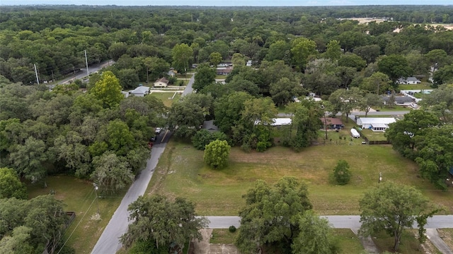 3800 NE 24th Ct, Ocala, FL 34479 - aerial view of property and surrounding area featuring a heavily wooded area