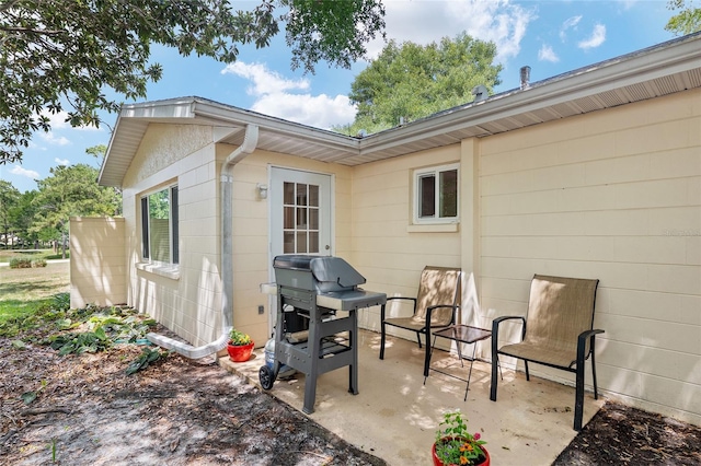 9290 SW 89th Ter Unit D, Ocala, FL 34481 - view of patio / terrace featuring a grill