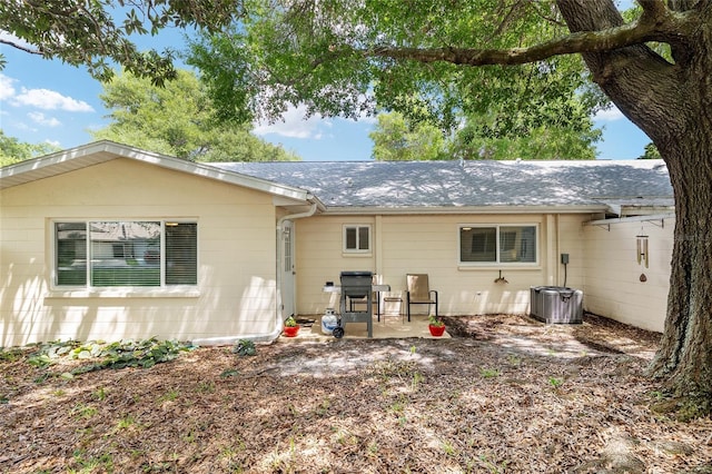 9290 SW 89th Ter Unit D, Ocala, FL 34481 - back of house featuring a patio
