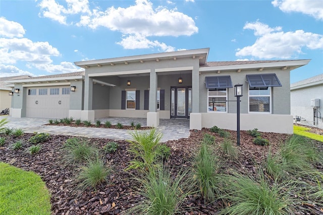 8465 SW 101st Ave, Ocala, FL 34481 - view of front facade with stucco siding and an attached garage