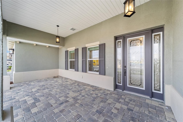 8465 SW 101st Ave, Ocala, FL 34481 - property entrance with stucco siding