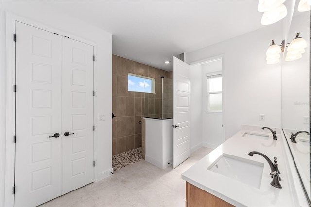 8465 SW 101st Ave, Ocala, FL 34481 - bathroom with plenty of natural light, walk in shower, double vanity, baseboards, and recessed lighting