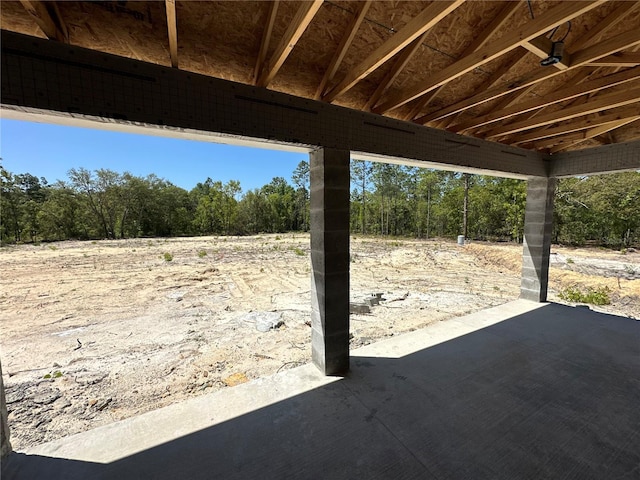 12282 SW 80th St, Dunnellon, FL 34432 - view of patio featuring view of scattered trees