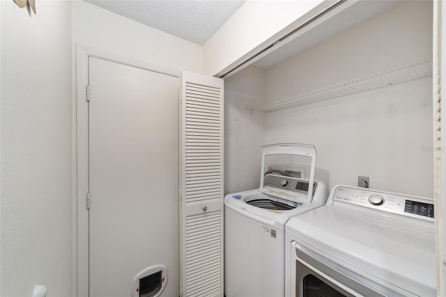 8998 SW 94th St Unit D, Ocala, FL 34481 - laundry room with washer and clothes dryer