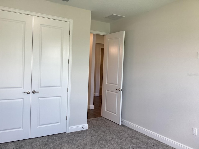 10540 SW 49th Avenue Rd, Ocala, FL 34476 - unfurnished bedroom featuring carpet floors, baseboards, and a closet