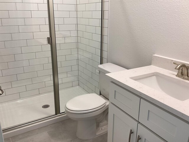 10540 SW 49th Avenue Rd, Ocala, FL 34476 - bathroom with a shower stall, a textured wall, vanity, and toilet