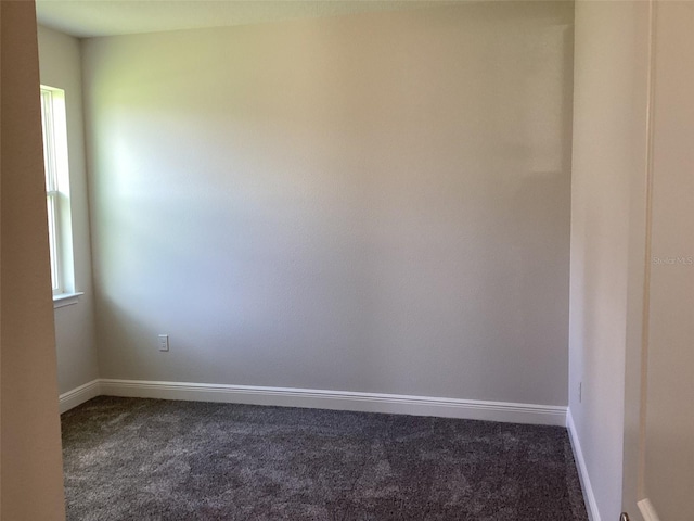 10540 SW 49th Avenue Rd, Ocala, FL 34476 - empty room with dark colored carpet and baseboards